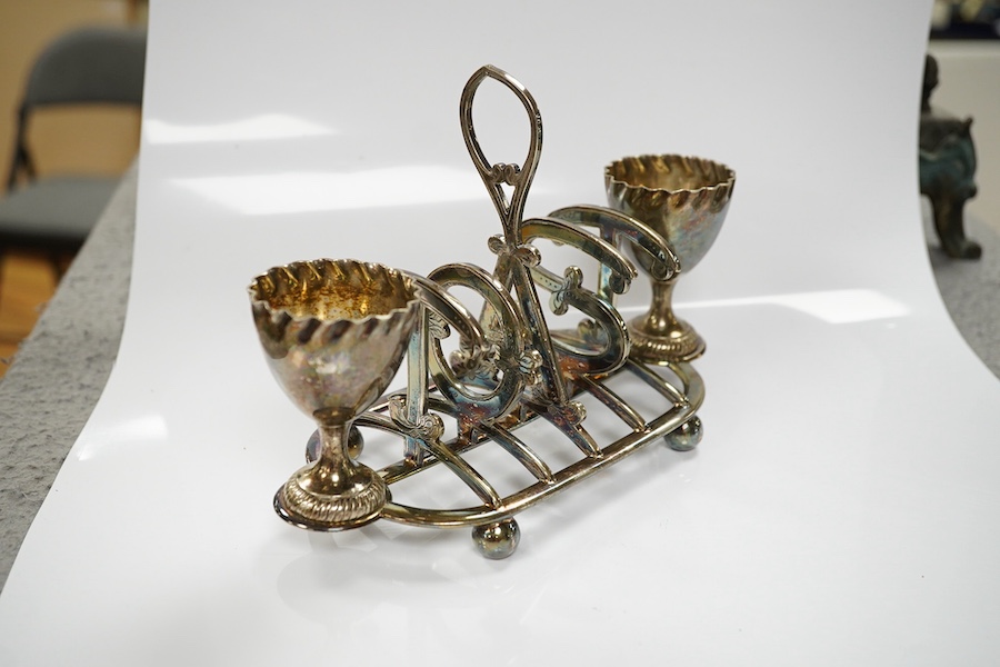 A novelty silver plated 'TOAST' combined toastrack and egg cruet, 17.5cm. Condition - slight wear to the plating